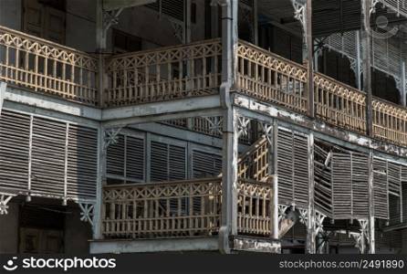 Nonthaburi, Thailand - APR 13, 2022 : Architecture of ancient Thai style house from teak wood. Old wooden building of the historical nonthaburi city Hall, Selective focus.