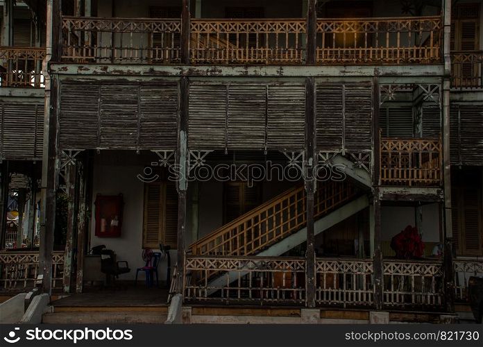 Nonthaburi, Thailand - JUL 21,2019 : View of old city hall, European style building. The vintage white wooden house was left to deteriorate over time, Once be Former city hall. Established on 1548, is tranformed to be the museum of Nonthaburi in 2009.