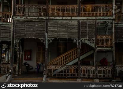 Nonthaburi, Thailand - JUL 21,2019 : View of old city hall, European style building. The vintage white wooden house was left to deteriorate over time, Once be Former city hall. Established on 1548, is tranformed to be the museum of Nonthaburi in 2009.