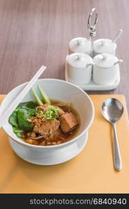 Noodle with pork stew in soy sauce soup