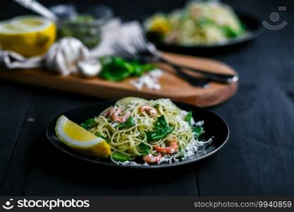 Noodles with seafood and lemon. A dish in a restaurant.. Noodles with seafood and lemon. dish in a restaurant.