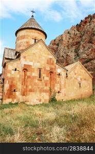 Noravank monastery in Armenia, red rocky mountains.