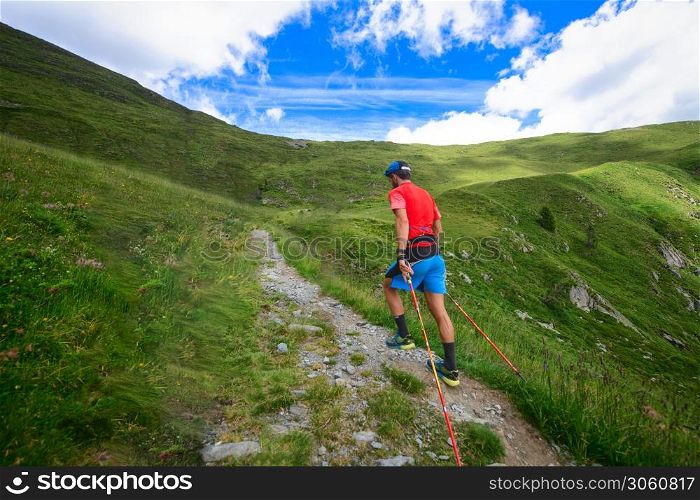 Nordic Walking on an uphill mountain path