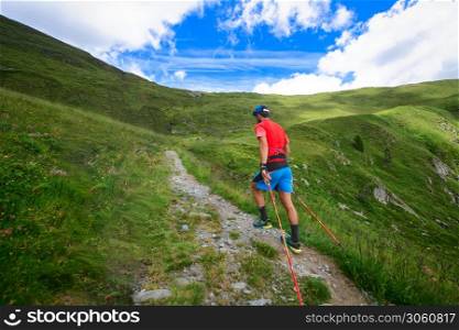 Nordic Walking on an uphill mountain path