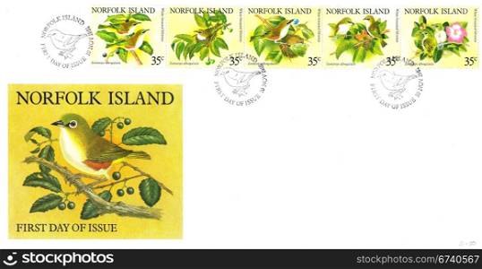 NORFOLK ISLAND - CIRCA 1981: A stamp series printed in Norfolk Island on First Day of Issue Envelope shows White-breasted Silvereye Birds, circa 1981