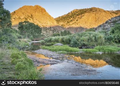 North Fork of Cache la Poudre River in Eagle Nest Open Space in northern Colorado at Livermore near Fort Collins, late summer sunset