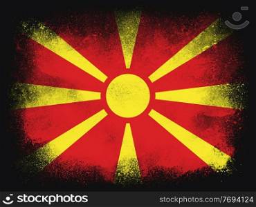 North Macedonia Flag design composition of exploding powder and paint, isolated on a black background for copy space. Colorful abstract dust particles explosion. Euro 2020 football symbol for printing