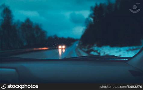 Norway adventures, night road trip, traveling in the car at nighttime, driving along highway in rainy night, enjoy travels. Night road trip in the car