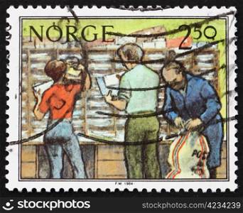 NORWAY - CIRCA 1987: a stamp printed in the Norway shows Sorting Letters, Postal Service, circa 1987