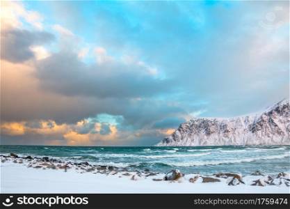 Norway. Lofoten. Winter Morning, Ocean surf between the mountains. Winter Norway. Morning and Sea Surf