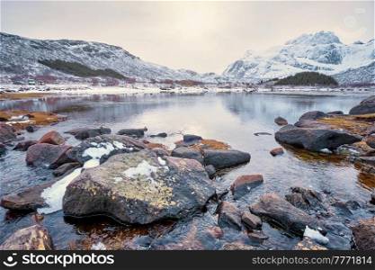 Norwegian fjord in winter. Lofoten islands, Norway. Fjord in winter, Norway