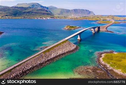 Norwegian scenic landscape on Lofoten archipelago. Road and bridge connecting the islands over the sea. National tourist route 10 Norway. Aerial view. Lofoten islands landscape, Norway