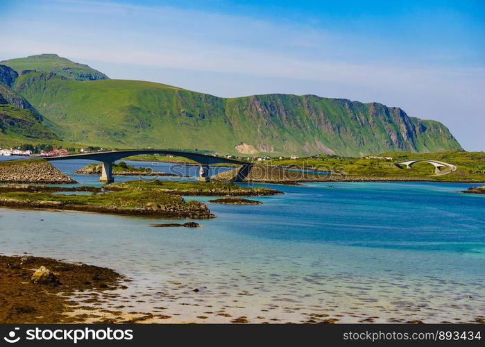 Norwegian scenic landscape on Lofoten archipelago. Road and bridge connecting the islands over the sea. National tourist route 10 Norway.. Road and bridge over sea., Lofoten Norway