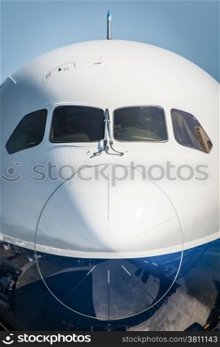 nose cone closeup of a larger passenger jet airliner