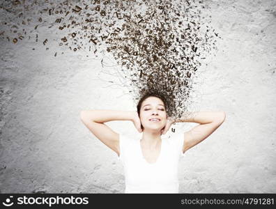 Not a sound. Young woman closing her ears with palms and enjoying the silence