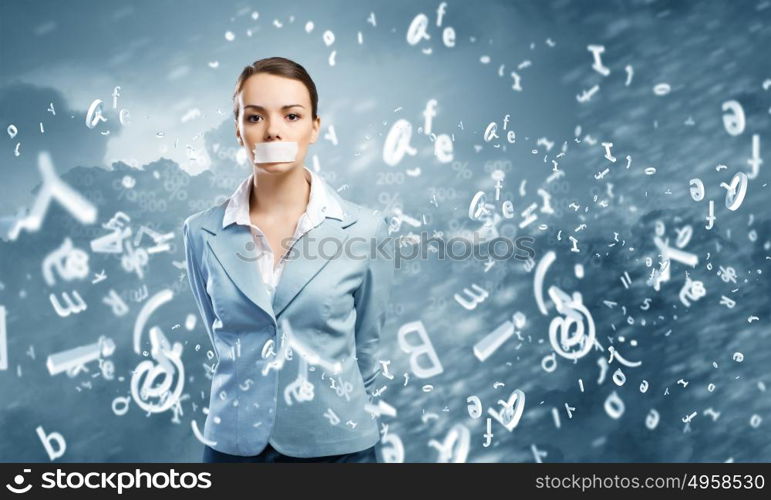 Not a word. Young speechless businesswoman with adhesive tape on mouth