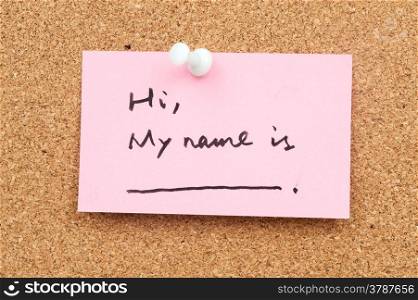 "Note paper pinned on cork board which written "Hi, My name is""