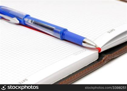 Notebook and ball-point pen