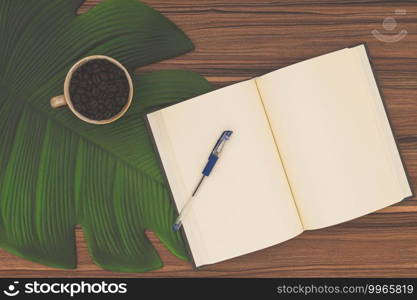 Notebook and coffee mug On the desk