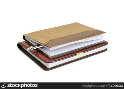 Notebook and pen isolated on a white background