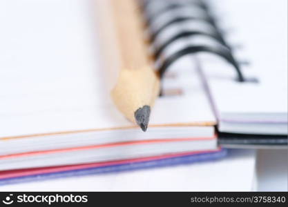 Notebook and pencil