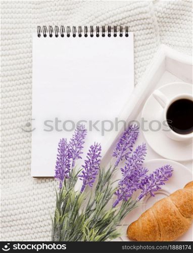 notebook beside tray with breakfast . Resolution and high quality beautiful photo. notebook beside tray with breakfast . High quality and resolution beautiful photo concept