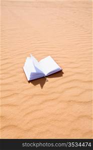 notebook on sand dune of Wadi Rum dessert, Jordan