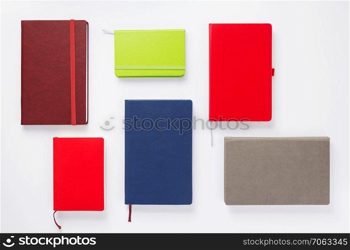 notebook or book with empty pages on white  background, top view