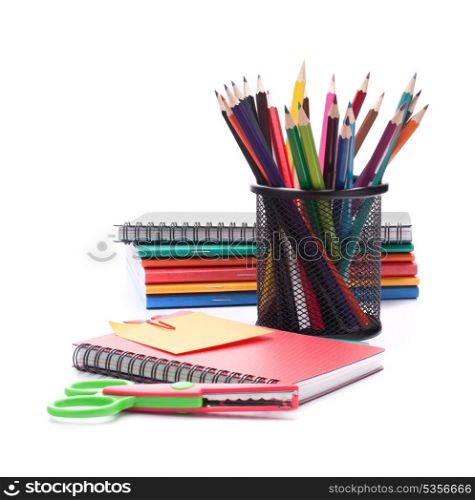 Notebook stack and pencils. Schoolchild and student studies accessories.