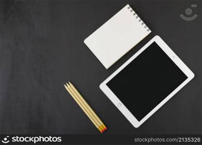 notebook tablet pencils