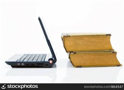 Notebook with opened lid with 2 books on the right, isolated on white. Education in new era of technology