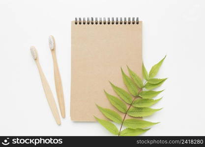 notebook with tooth brush