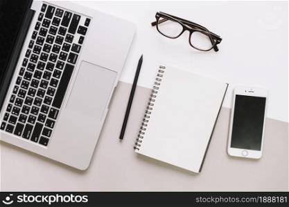 notepad glasses laptop smartphone . Resolution and high quality beautiful photo. notepad glasses laptop smartphone . High quality and resolution beautiful photo concept