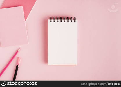 notepad office supplies colored surface . Resolution and high quality beautiful photo. notepad office supplies colored surface . High quality and resolution beautiful photo concept