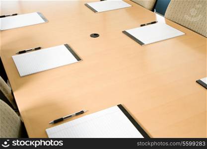 Notepads on conference table