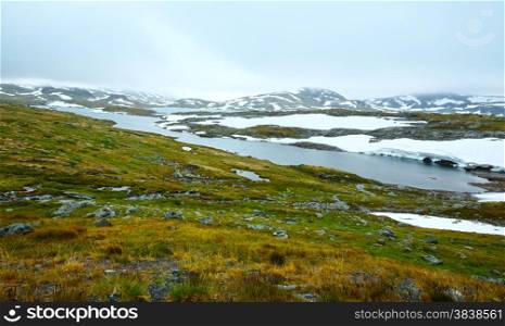 Noth Norway mountain spring tundra valley and small puddles