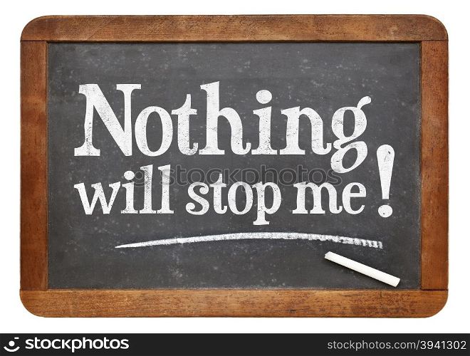 Nothing will stop me - positive affirmation text on a vintage slate blackboard