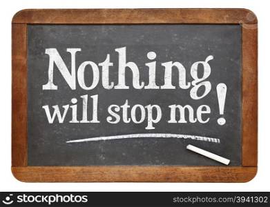 Nothing will stop me - positive affirmation text on a vintage slate blackboard