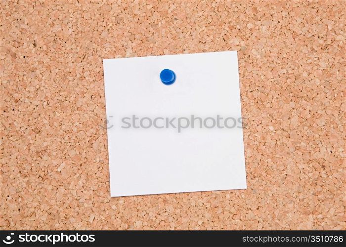 Noticeboard of cork with one paper in blank