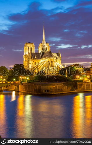 Notre Dame Cathedral with Paris cityscape and River Seine at dusk, France