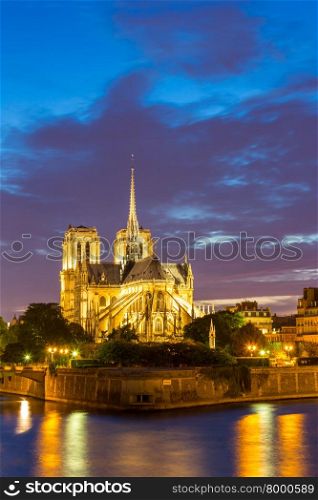 Notre Dame Cathedral with Paris cityscape and River Seine at dusk, France