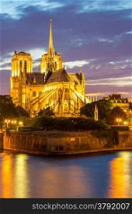 Notre Dame Cathedral with Paris cityscape panorama at dusk, France
