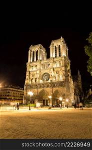 Notre Dame de Paris cathedral at night in Paris