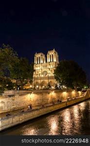 Notre Dame de Paris cathedral at night is one of the most visited places in Paris