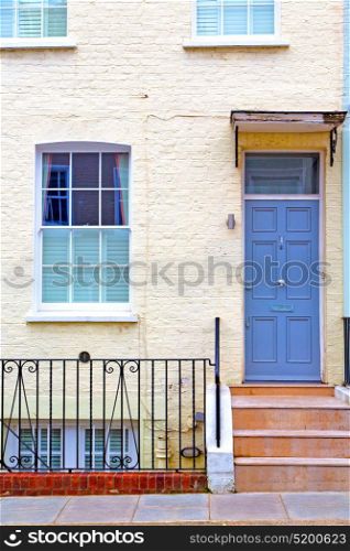 notting hill in london england old suburban and antique blue wall door