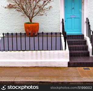 notting hill in london england old suburban and antique liliac wall door