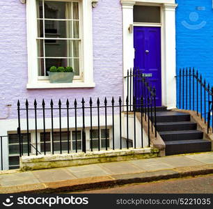 notting hill in london england old suburban and antique liliac wall door