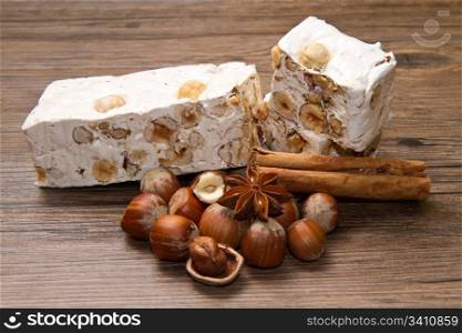 nougat with hazelnut on wooden table