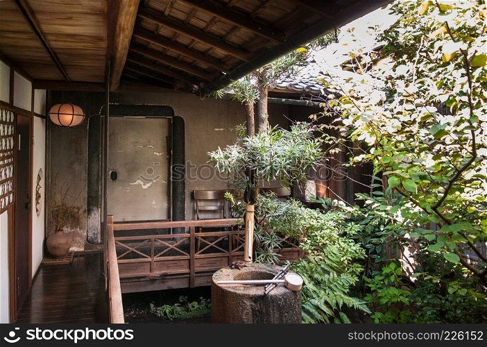 NOV 1, 2011 Nara, JAPAN : Old Japanese house and bamboo water fountain