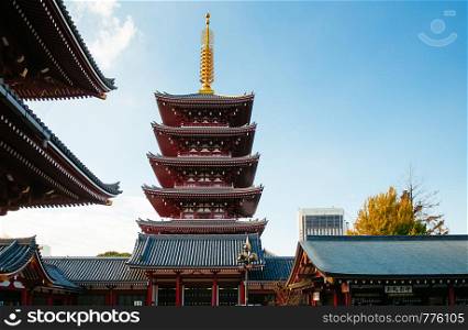 NOV 29, 2018 Tokyo, Japan - Many tourist at Asakusa Sensoji temple with five storey pagoda and red main hall roof Tokyo famous attraction